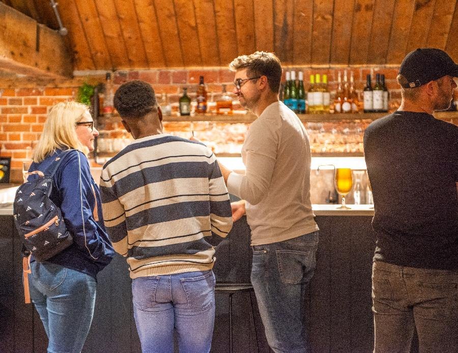 Corporate networking by the bar at YourHQ